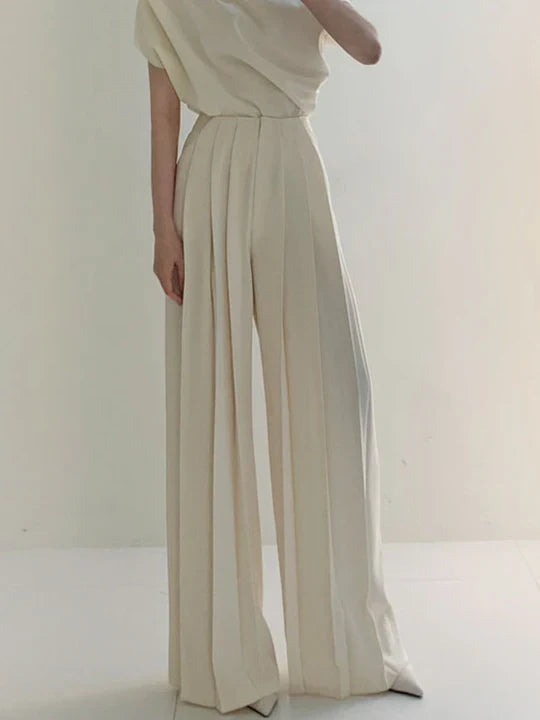 Pleated pants with high waist and wide leg